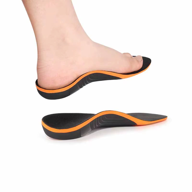 Bare foot beside a Camber high-arch orthotic insole showing the arch contour